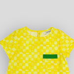 Yellow Checkerboard Trapeze Dress in OEKO-TEX Certified Cotton. Detail view of front pocket.
