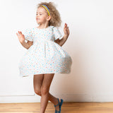 girl wearing star pattern dress