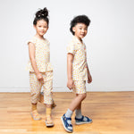 Six year old boy and girl wearing chicken outfit