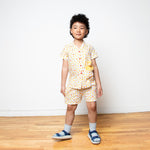 Six year old boy wearing chicken outfit.