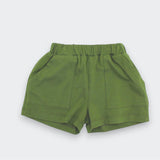 Sage Green shorts on a light gray background