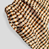 Brown Plaid Knit Jogger Pants for Babies and Kids. Detail view of side pocket.