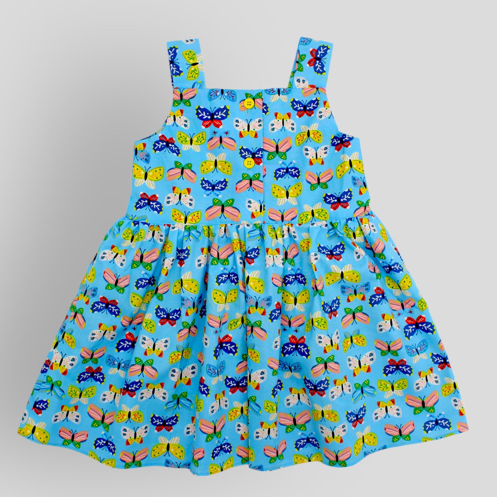 Cotton Sleeveless Dress  in Colorful Butterflies Print. Back view.