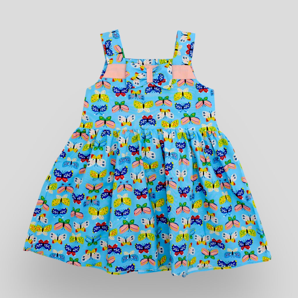 Cotton Sleeveless Dress  in Colorful Butterflies Print. Front view.