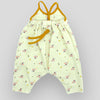 Yellow Floral Bug Strappy Jumpsuit. Back view.
