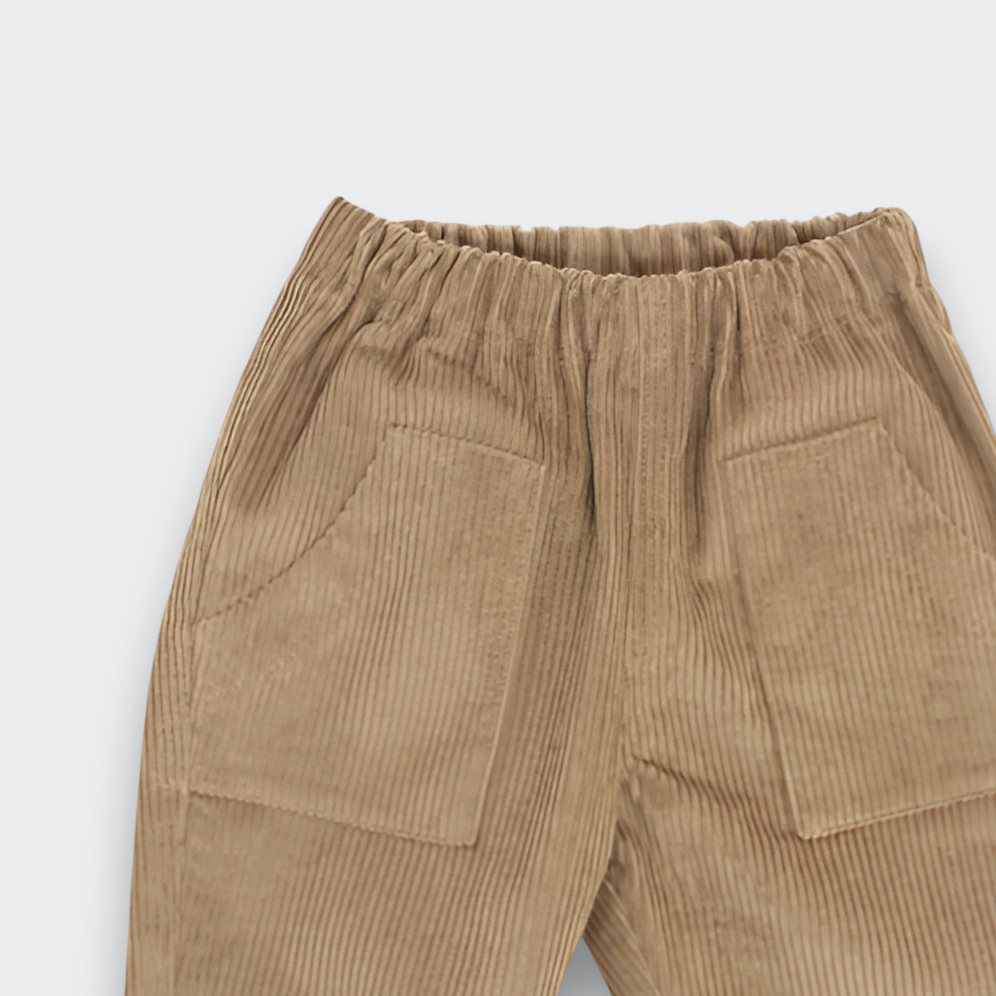 Little Moony Acorn Corduroy Pants made of soft cotton with relaxed tapered legs for babies and kids - Close up view