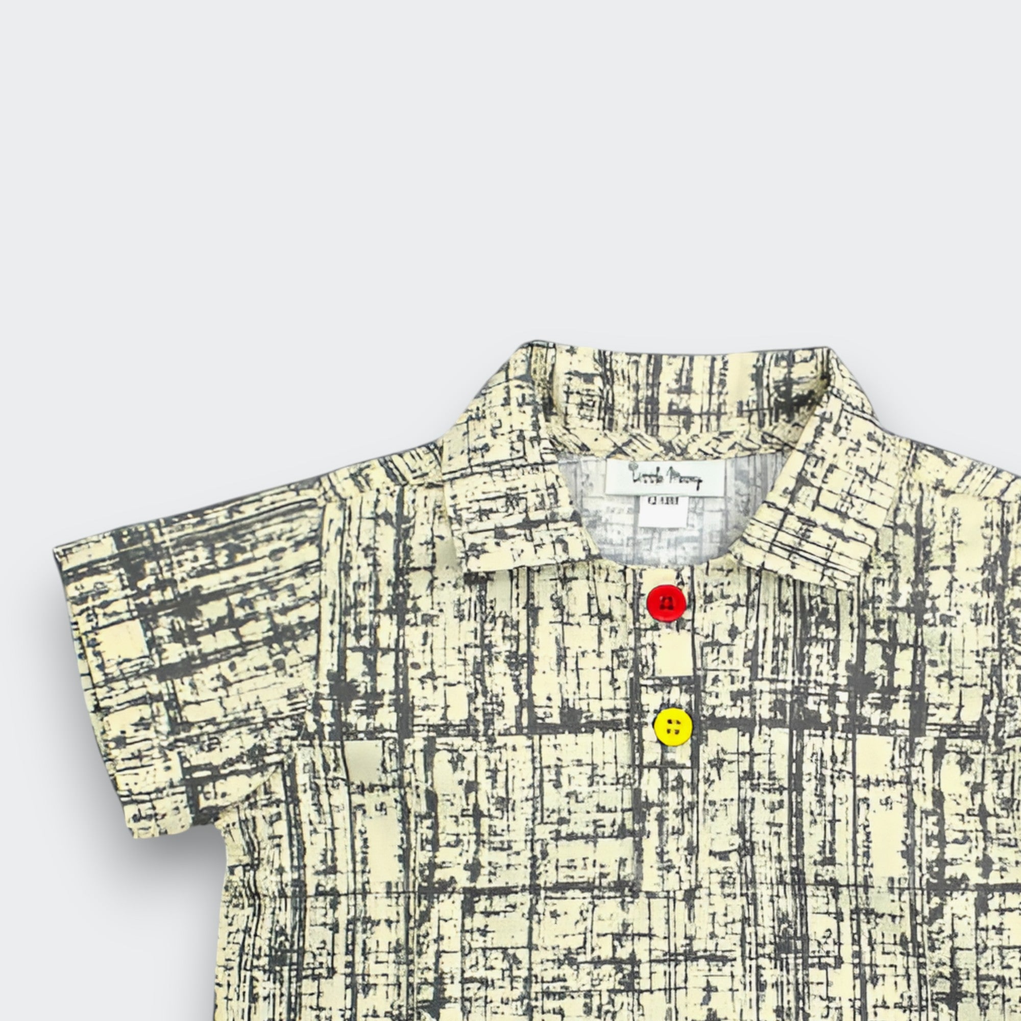 Little Moony Beige Polo Shirt showing the Fine Crosshatch Design and Colored Buttons - Detailed View