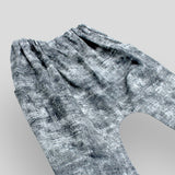 Baby and Kids Cotton Grey Harem Trousers for Babies and Kids with Acid Wash Effect Side. Side view.