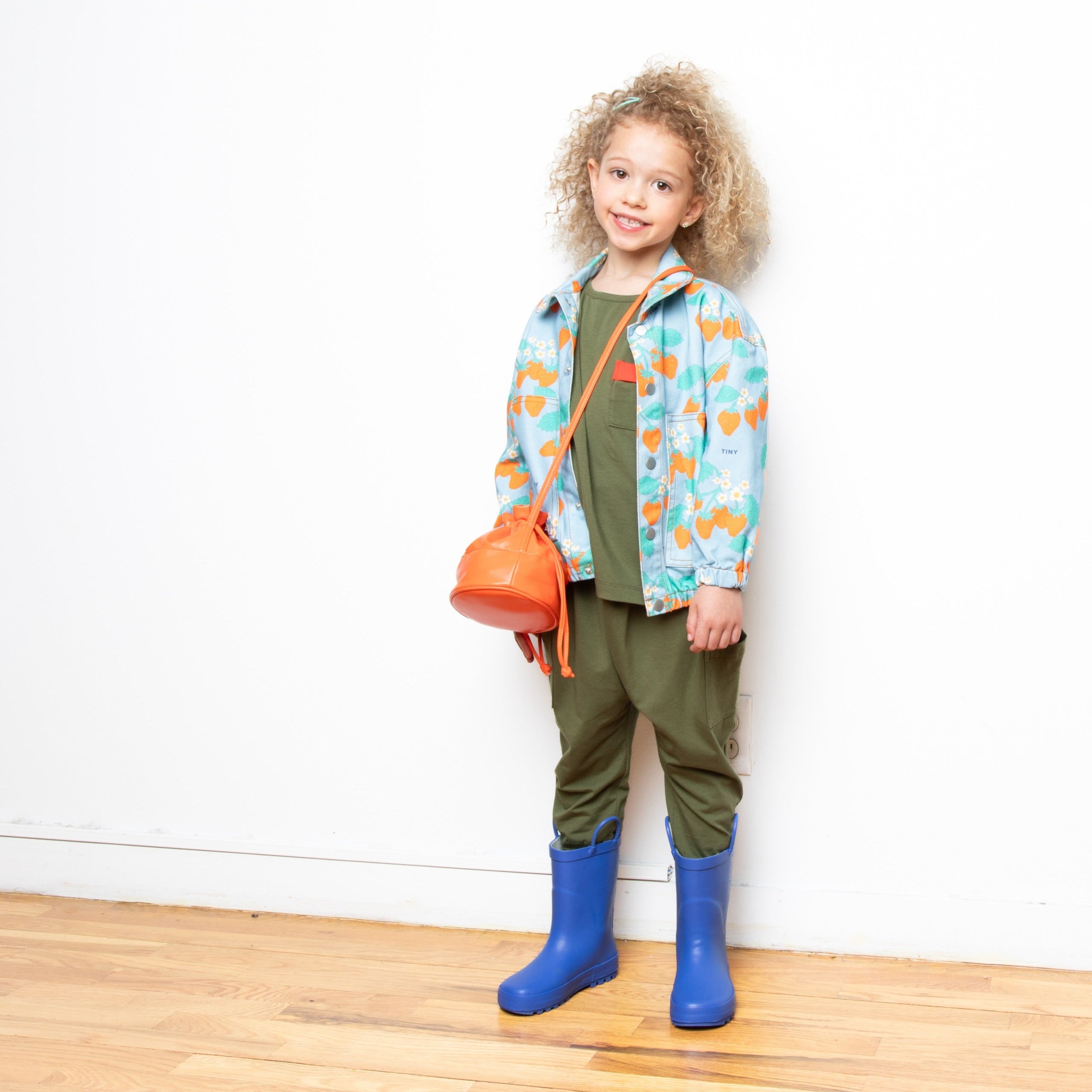 Girl wearing Soft Sage Long Sleeve Tee and pants