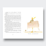 Little Moony The Little Prince Deluxe Edition children's classic book about friendship, imagination, and kindness for young readers and families. Sample page, boy sitting on a wall.