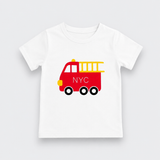 A white kids' short-sleeve t-shirt with a red fire truck graphic on the chest. The fire truck is decorated with a yellow ladder, yellow bumper, a yellow light, and the letters 'NYC' in white on the side.