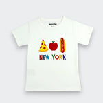 A white short-sleeve baby t-shirt with a colorful graphic of a pizza slice, an apple, and a hot dog spelling 'NEW YORK' on the chest, shown against a light gray background.