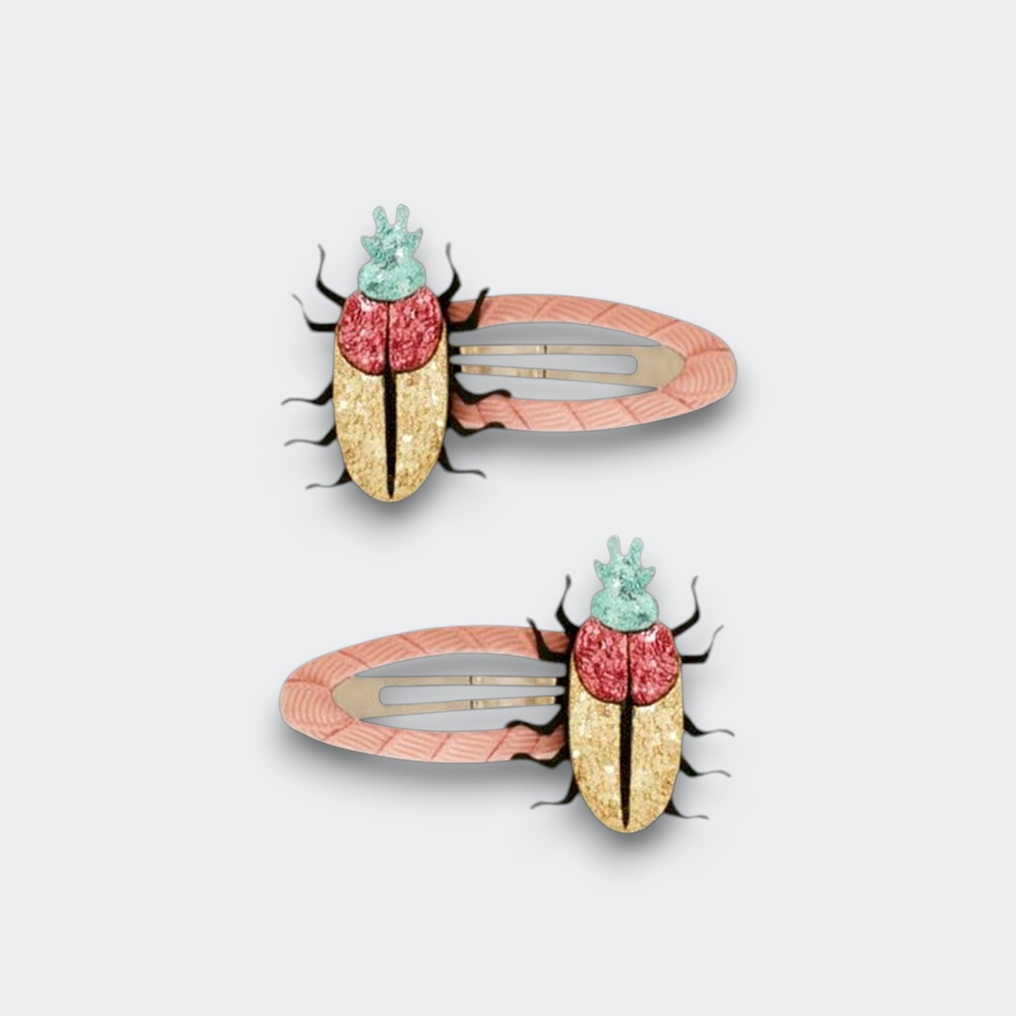 Little Moony Glitterbug Snaps sparkling hair clips for children, perfect for adding a playful touch to everyday hairstyles
