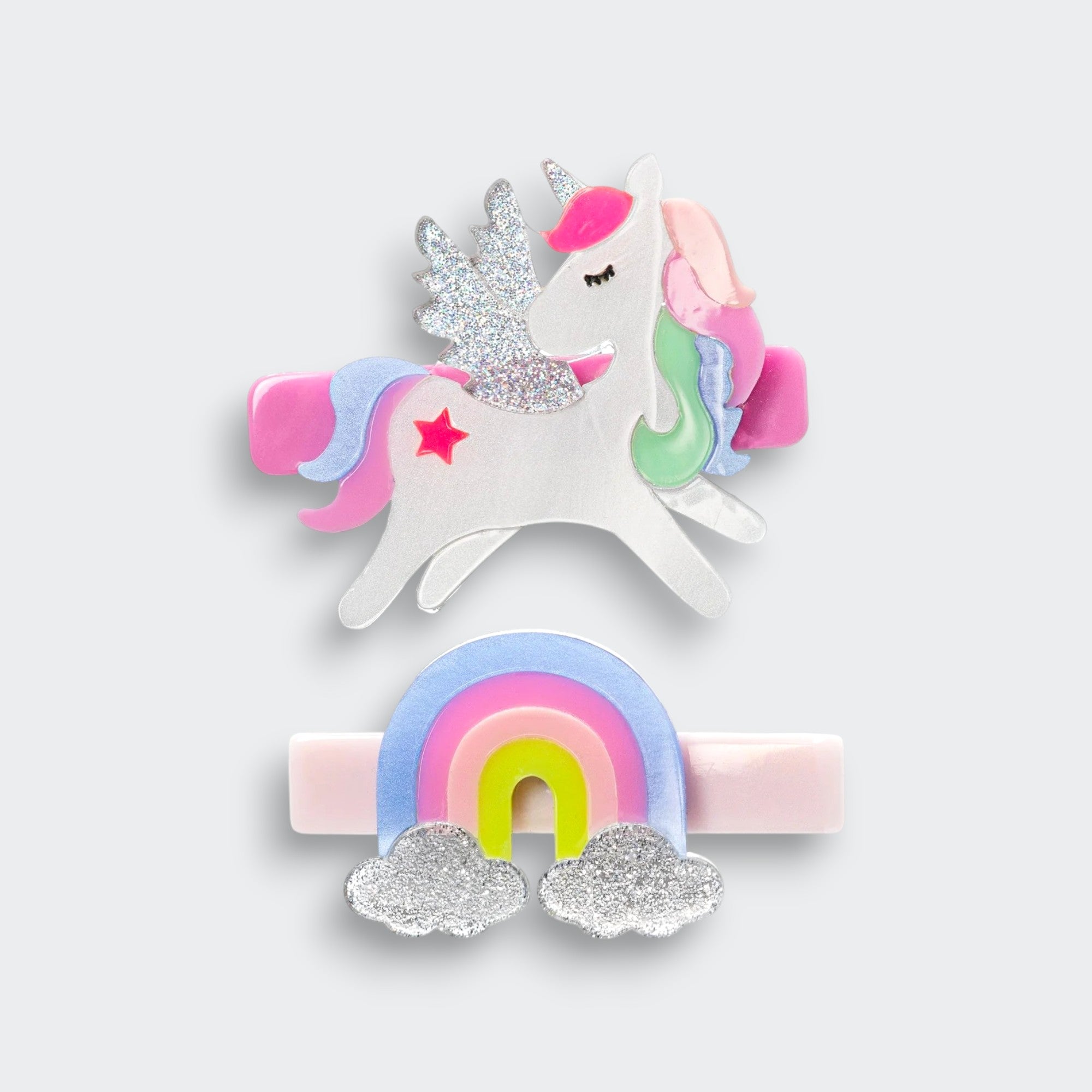 Little Moony unicorn pastel rainbow hair clips with colorful acrylic unicorn and rainbow designs for children’s hairstyles.