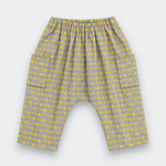 Gray and yellow patterned baby pants with an elastic waistband and side pockets, shown flat on a light gray background.