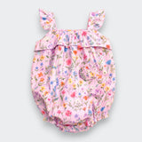 A pink floral baby bloomers romper with ruffled shoulder straps and a small front pocket, shown flat on a light gray background.