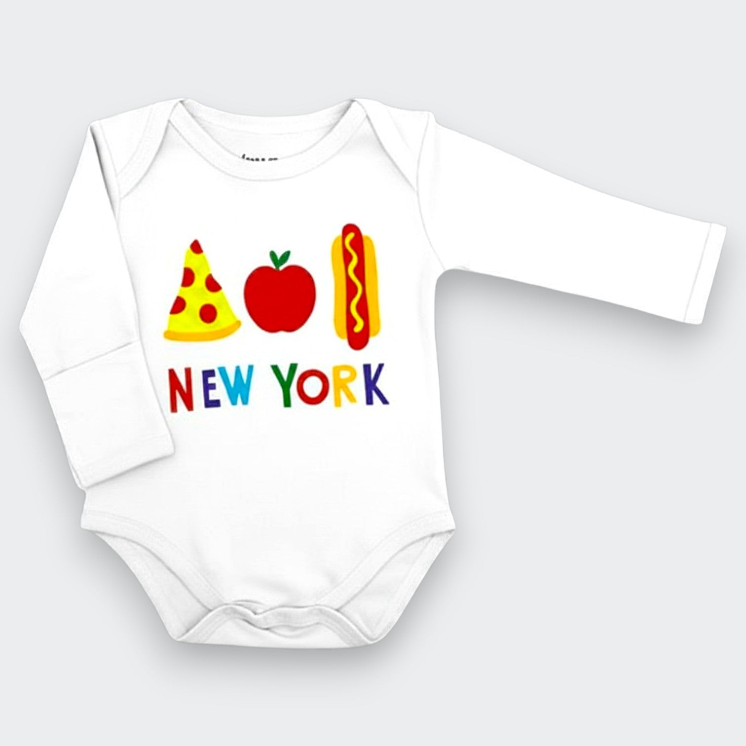 Little Moony. A white long-sleeve baby bodysuit with a colorful graphic print featuring a pizza slice, an apple, a hot dog, and the word 'NEW YORK' in multicolored letters, displayed on a light gray background.