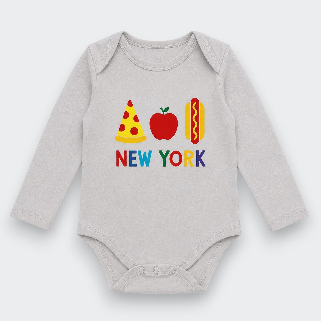 A light gray long-sleeve baby bodysuit with a colorful graphic on the chest featuring a slice of pizza, an apple, a hot dog, and the text 'NEW YORK' in multicolored letters.