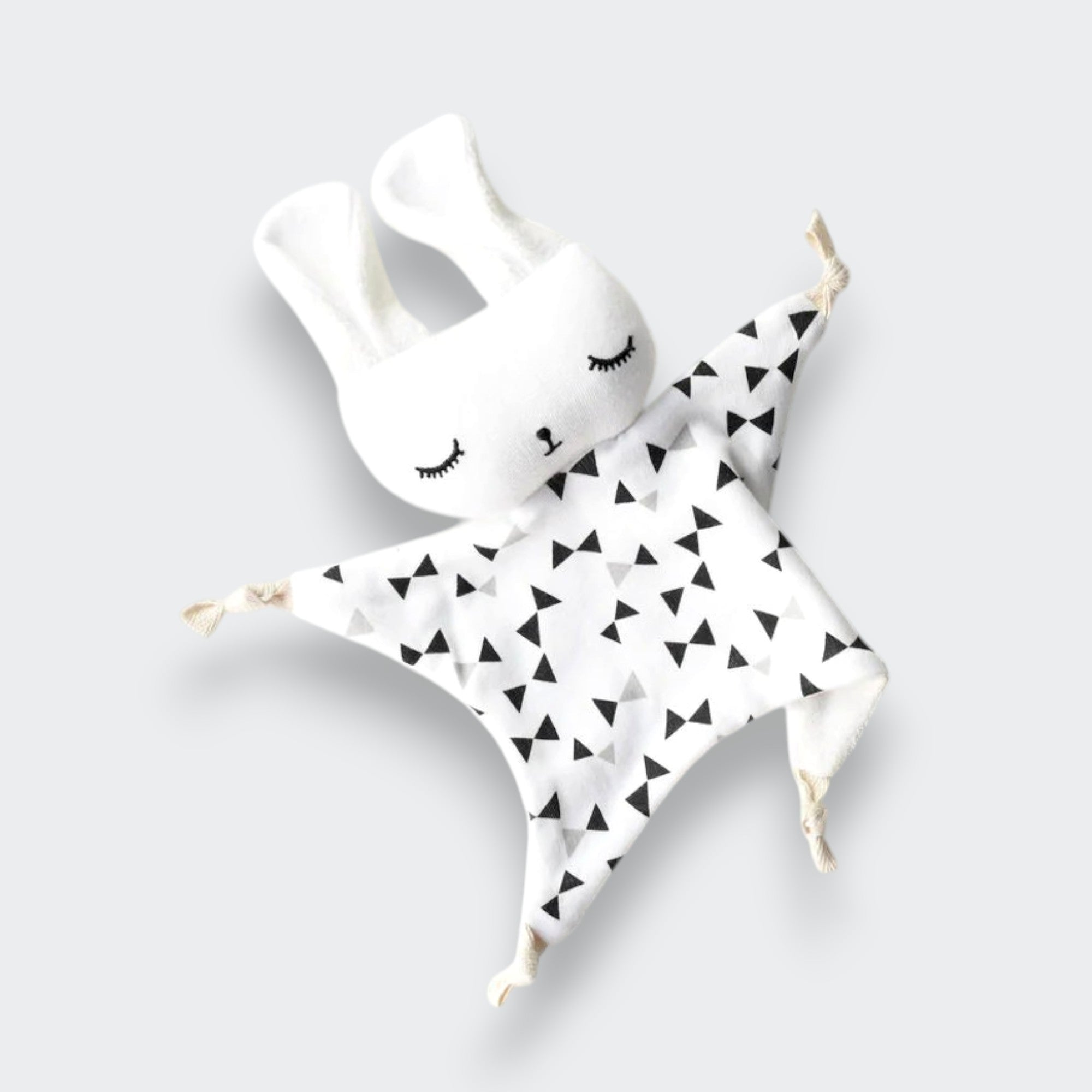 Little Moony Organic Cuddle Bunny Lovey with a soft, snuggly design and sweet bow tie detail for babies and toddlers