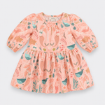 Little Moony gir's long-sleeve dress by Little Mary, featuring a peach-pink base with a whimsical print of fairies, woodland plants, and blue birds. The dress has a smocked bodice, puffed sleeves, and a gathered skirt, shown flat on a light gray background.