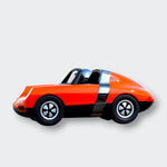 Little Moony Luft Orange toy car with a sleek modern design for imaginative play and young vehicle enthusiasts. Side view.