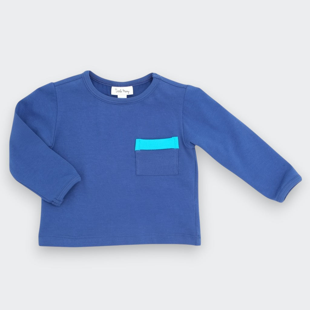 Blue long-sleeve shirt with a turquoise pocket on a white background