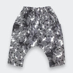 Black and white patterned pants on a white background