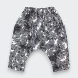 Black and white patterned pants on a white background