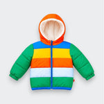 A kids’ hooded puffer jacket laid flat on a light gray background. It has an orange hood with white plush lining, green quilted sleeves, a blue front zipper, and horizontal panels in blue, yellow, orange, pale blue, and green.