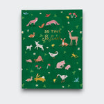 A dark green baby greeting card reading “So tiny, so sweet,” surrounded by small illustrations of woodland animals, birds, flowers, and mushrooms.