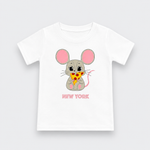 A white short-sleeve kids' t-shirt with a cartoon graphic of a gray mouse holding a slice of pizza, with pink ears and the text 'NEW YORK' printed below in pink.