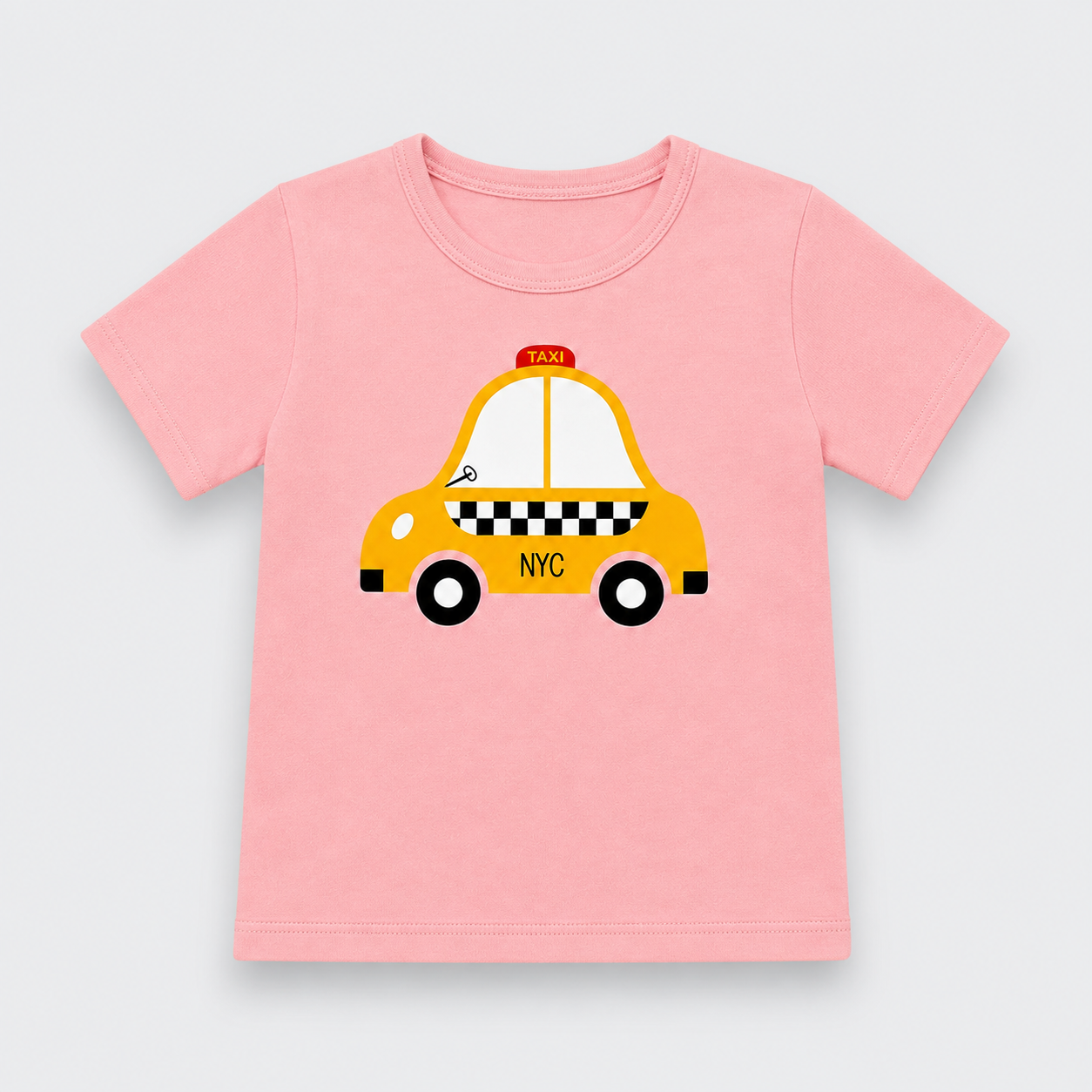 A pink short-sleeve kids' t-shirt featuring a cartoon graphic of a yellow NYC taxi with black and white checkered stripes, displayed on a light gray background.