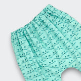 Detailed view of Little Moony mint green cotton harem pants featuring playful cat print and made with breathable soft cotton for babies and kids
