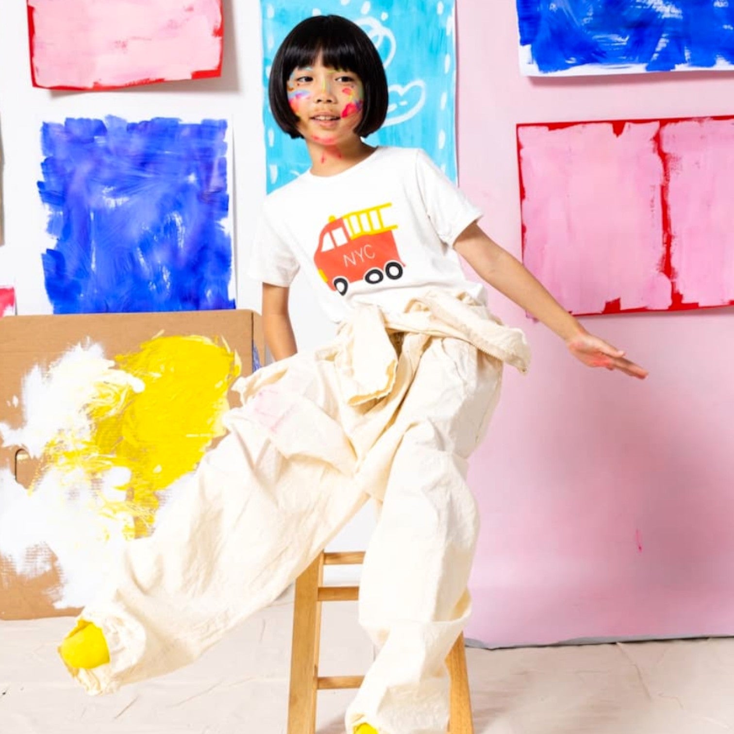 Girl wearing firetruck t-shirt