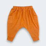 Little Moony Sienna brick jogger pants made from cotton knit fabric with elastic waistband and front pockets for babies and kids