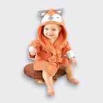 Baby wearing a Little Moony Fox Bath Towel with adorable hood and soft terry cotton for babies 0–9 months