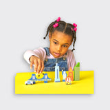 Girl playing Little Moony NYC City in My Pocket miniature wooden New York City landmarks toy for kids.