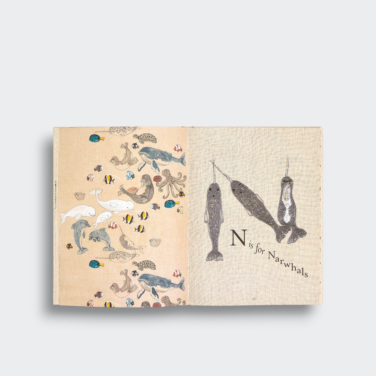 N is for Narwhals spread from ABC: An Animal Alphabet Adventure, showing three narwhals beside colorful sea animals on a light gray background.