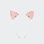 Candy pink glitter cat-ear headband edged with pink daisies and gold-tone centers, on a slim silver-tone band against a light gray background.