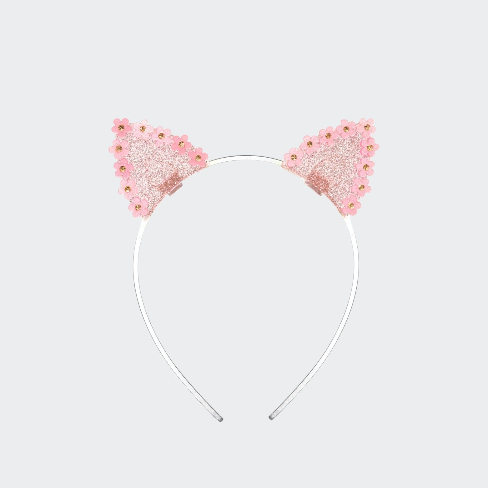 Candy pink glitter cat-ear headband edged with pink daisies and gold-tone centers, on a slim silver-tone band against a light gray background.