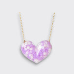 Little Moony Dotty Heart Necklace in Purple with confetti-filled resin heart and gold chain for kids