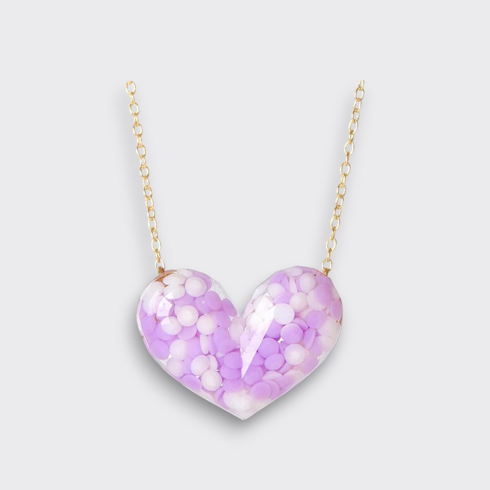 Little Moony Dotty Heart Necklace in Purple with confetti-filled resin heart and gold chain for kids