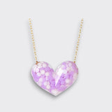 Little Moony Dotty Heart Necklace in Purple with confetti-filled resin heart and gold chain for kids