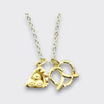 Gold-tone charm necklace with a pizza slice and pretzel pendant on a light gray background.