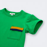 Close up of color blocked mustard yellow and navy pocket on Little Moony Jade Green Pocket Tee