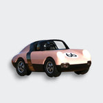 Front view of the Luft Pop pink toy car, showing white headlights, a number 66 hood decal, and a black windshield on a light gray background.