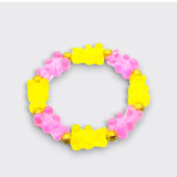 Little Moony Pink and Yellow Gummy Bear Stretch Bracelet with resin bear beads and gold spacers for kids