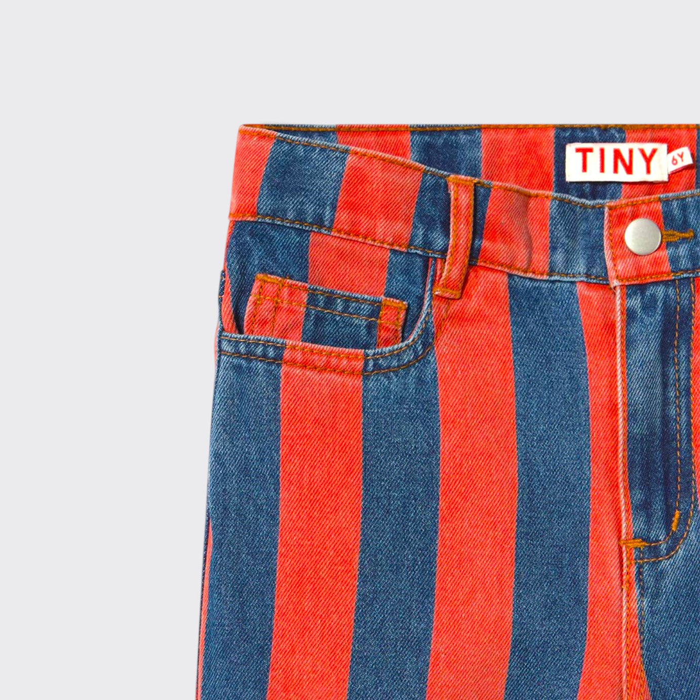 Little Moony Red Stripes Straight Denim Pants with bold red and blue stripes for kids and toddlers close up view