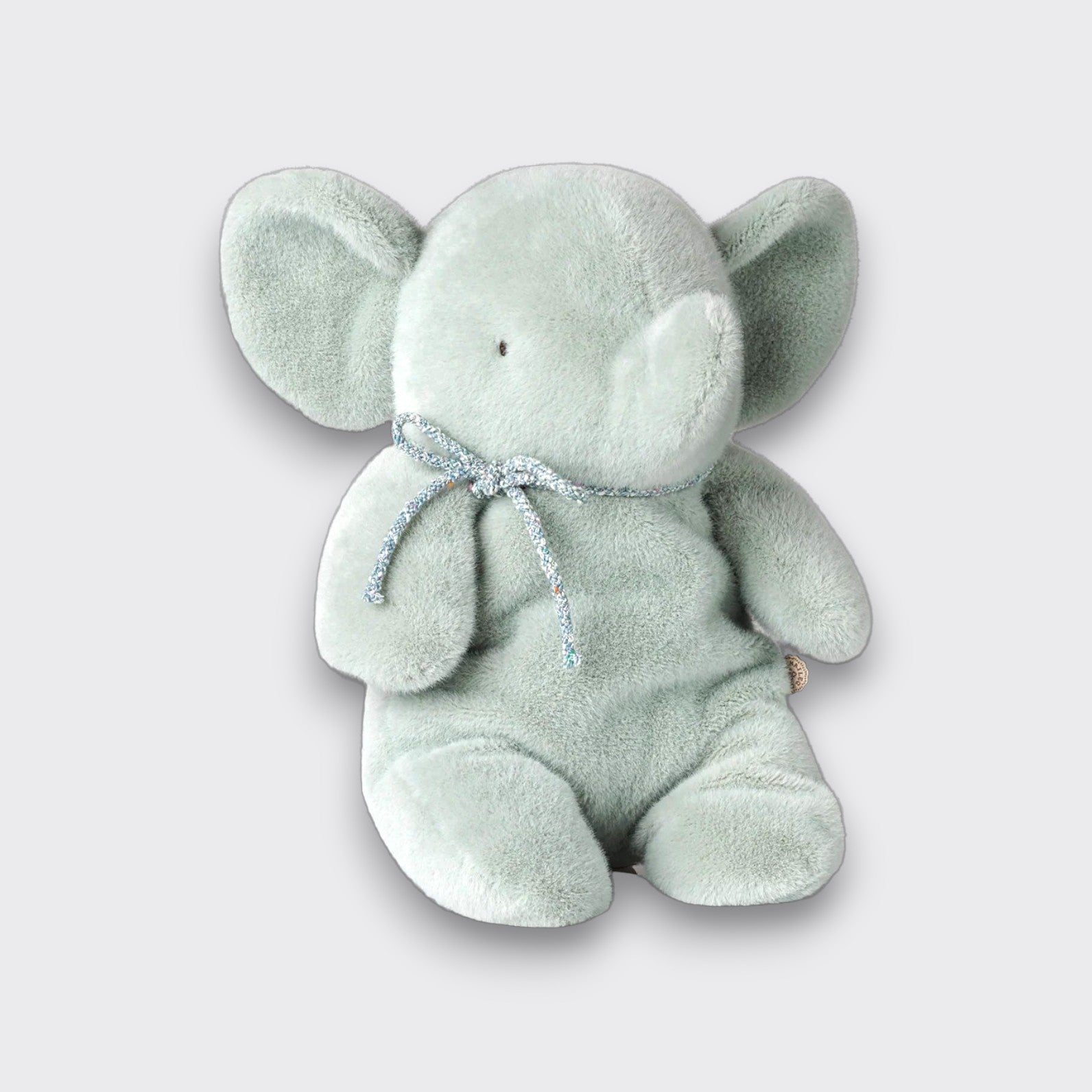Soft mint elephant plush toy with large ears and a silver bow, shown from the front on a light gray background.