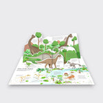 ime of the Giants pop-up page from The Ultimate Book of Dinosaurs and Other Prehistoric Creatures, showing long-necked dinosaurs among green trees on a light gray background.